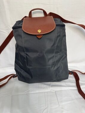 Longchamp Black Nylon Backpack with Brown Leather Flap and Brown Straps